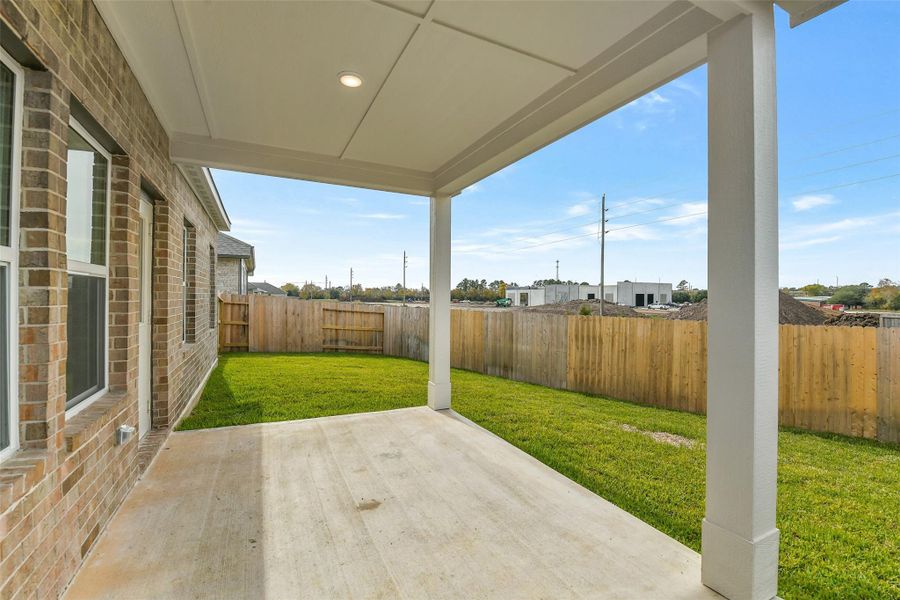 Exterior details and patio area of a home in Windmill Estates, Magnolia (Image 28). Exterior details and patio area of a home in Windmill Estates, Magnolia (Image 28).