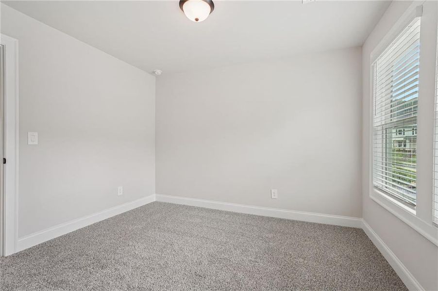 Spacious, unfurnished interior of a new home in Hemingway - Reserve Series, Cumming (Image 34).