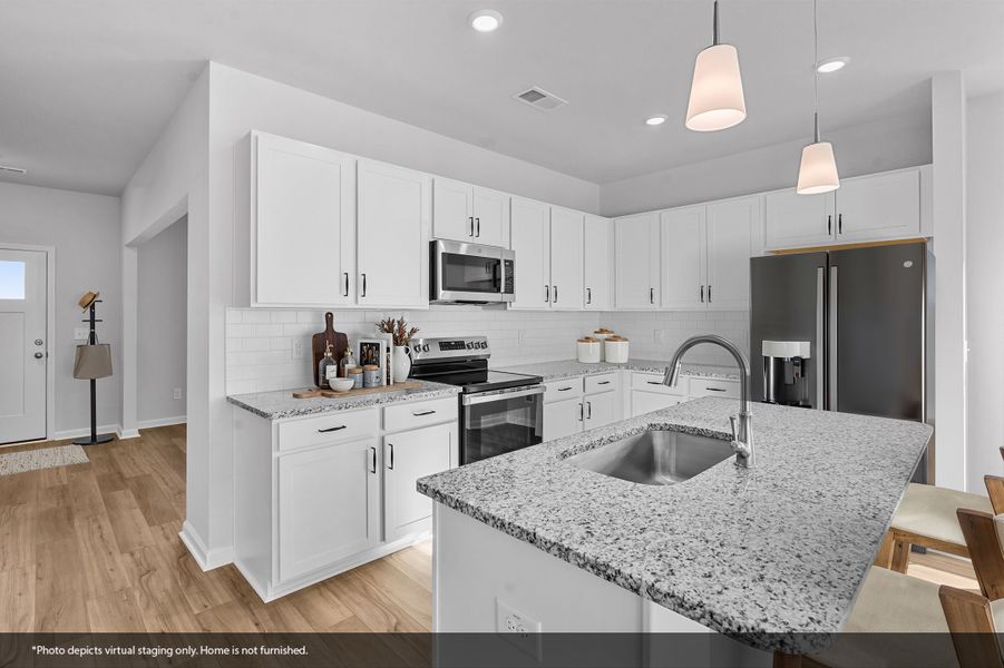Furnished interior view inside a new home in Fieldstone, Lexington (Image 6).