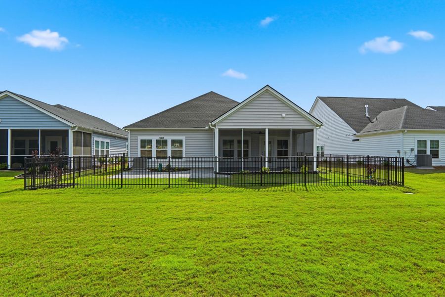 Exterior details and patio area of a home in Horizons at Summers Corner | 55+, Summerville (Image 34).