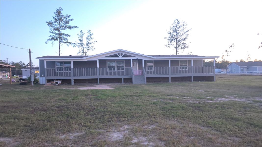 Exterior details and patio area of a home in , Conroe (Image 2). Exterior details and patio area of a home in , Conroe (Image 2).