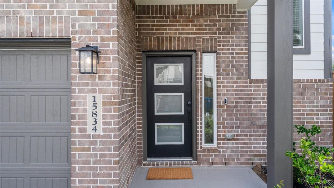 Exterior details and patio area of a home in Balmoral, Humble (Image 3).