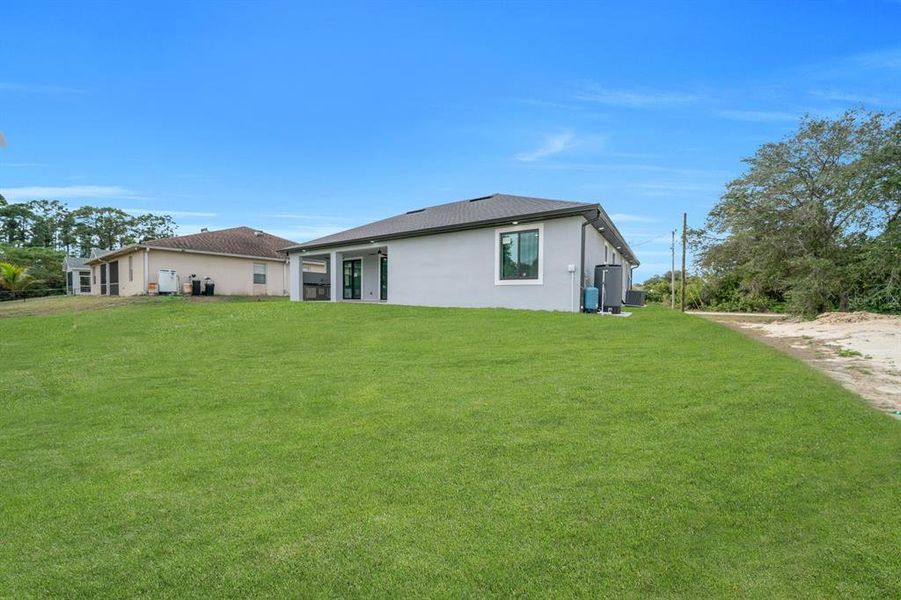 Exterior details and patio area of a home in , Lehigh Acres (Image 25).