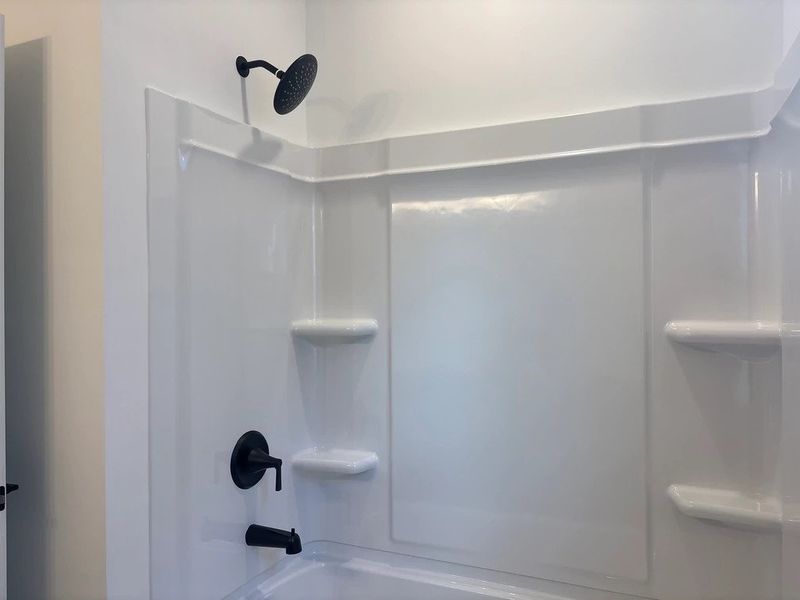 Bath 2 featuring the AW Collection® Foundry - Strong lines and deep tones define the space.