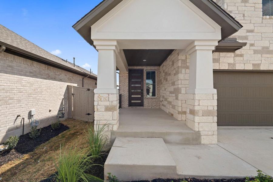 Exterior details and patio area of a home in Flora, Hutto (Image 24).