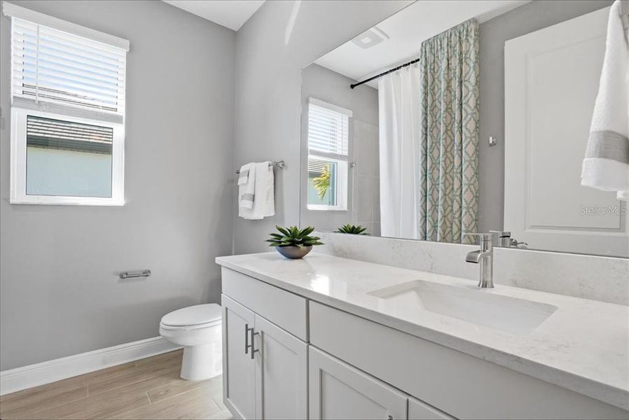 Furnished interior view inside a new home in Cypress Glen at River Wilderness, Parrish (Image 8).