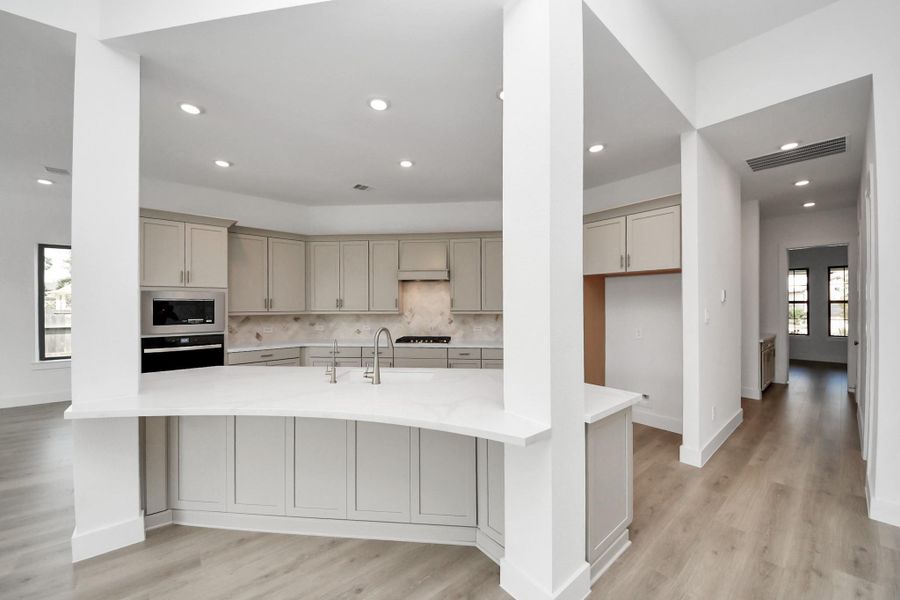 Furnished interior view inside a new home in ARTAVIA: Hilltop Collection, Conroe (Image 6).