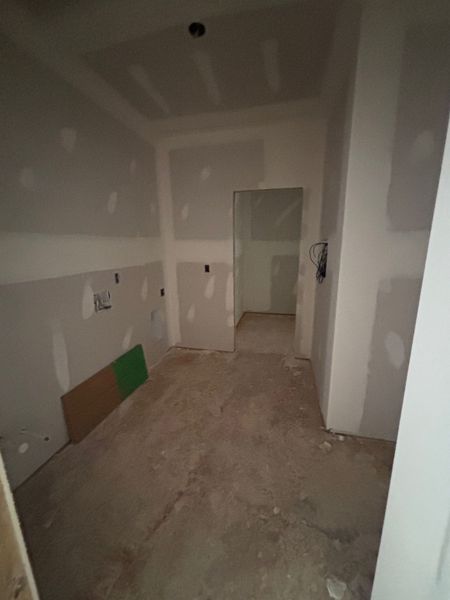 In-progress construction of a new home in White Oaks, The Rock, GA (Image 13).