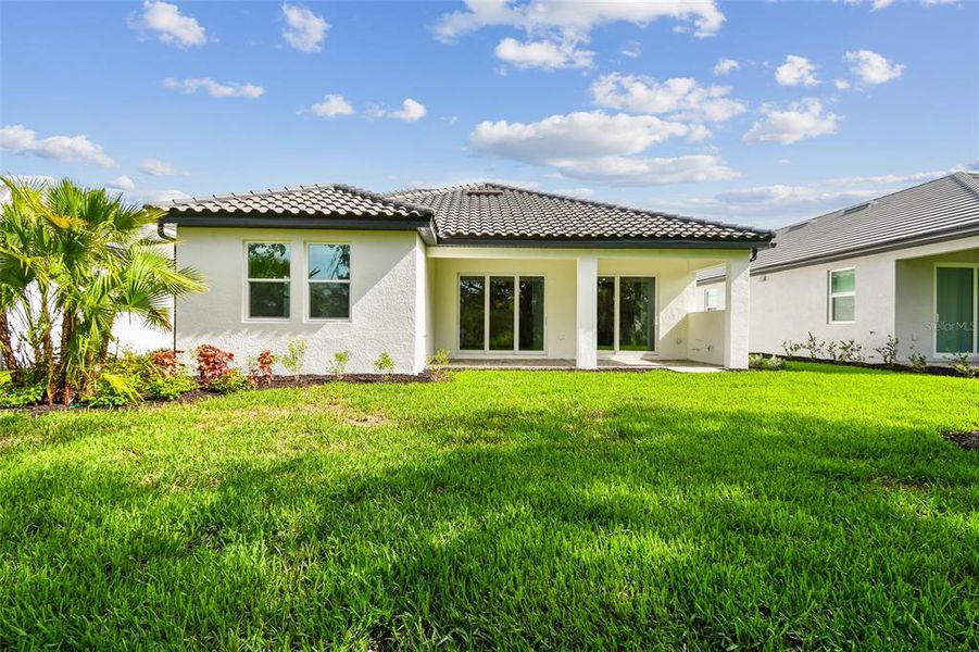 Exterior details and patio area of a home in Grand Park, Sarasota (Image 3). Exterior details and patio area of a home in Grand Park, Sarasota (Image 3).