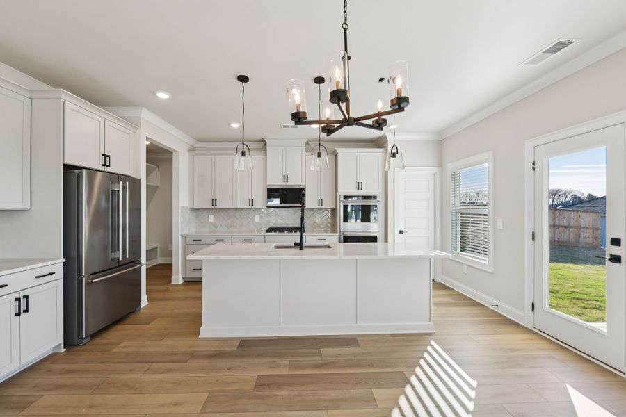 Furnished interior view inside a new home in Vines at Mill Creek - Legacy Series, Braselton (Image 3). Furnished interior view inside a new home in Vines at Mill Creek - Legacy Series, Braselton (Image 3).