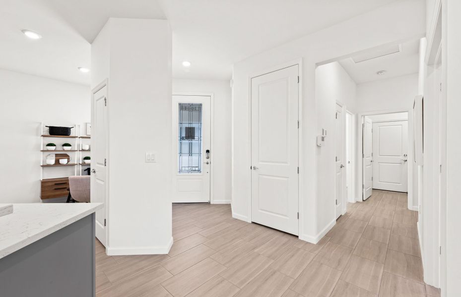 Representative unfurnished interior of a home built from the Cascadia by DiVosta in BeachWalk by Manasota Key, Englewood (Image 19).