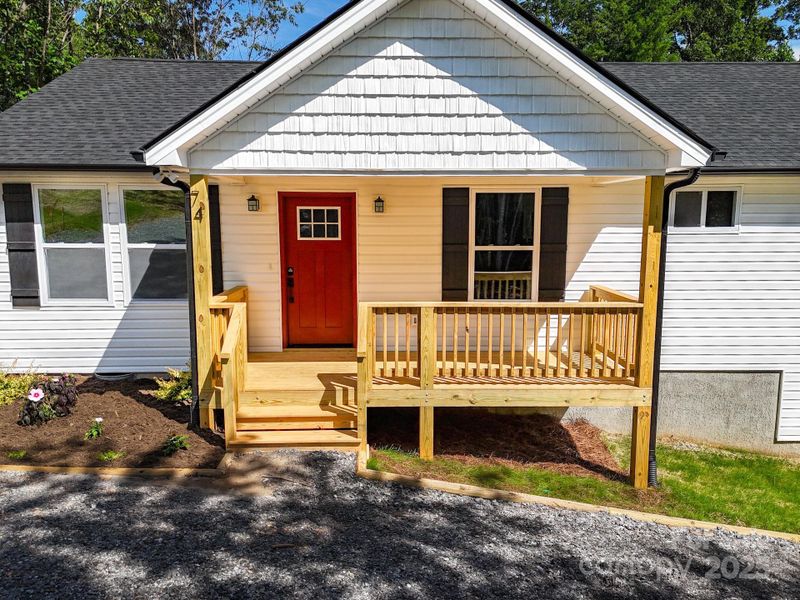 Front exterior of a new home in , Candler, NC, highlighting curb appeal (Image 21). Front exterior of a new home in , Candler, NC, highlighting curb appeal (Image 21).