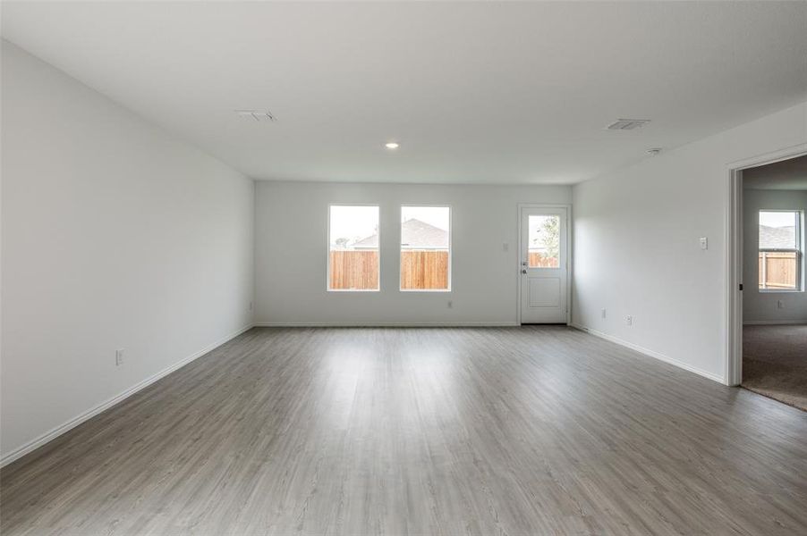 Empty room with wood-type flooring