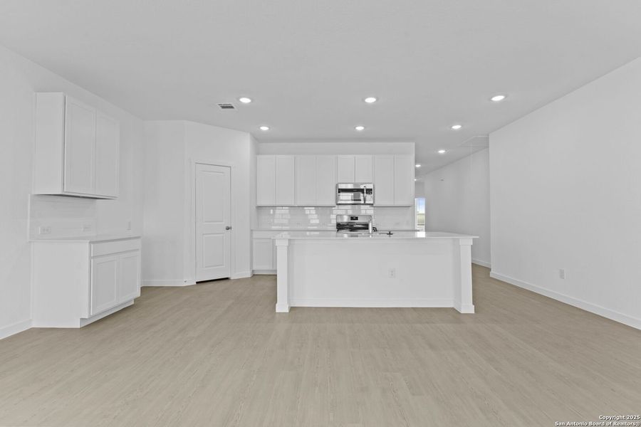 Furnished interior view inside a new home in , New Braunfels (Image 6).