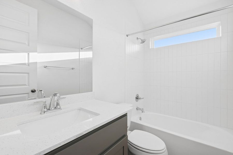 Furnished interior view inside a new home in The Colony, Bastrop (Image 12).