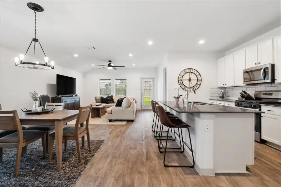 Kitchen & dining open to living room Kitchen & dining open to living room