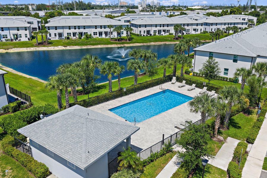 Front exterior of a new home in Enclave at Mangonia Park, West Palm Beach, FL, highlighting curb appeal (Image 18).