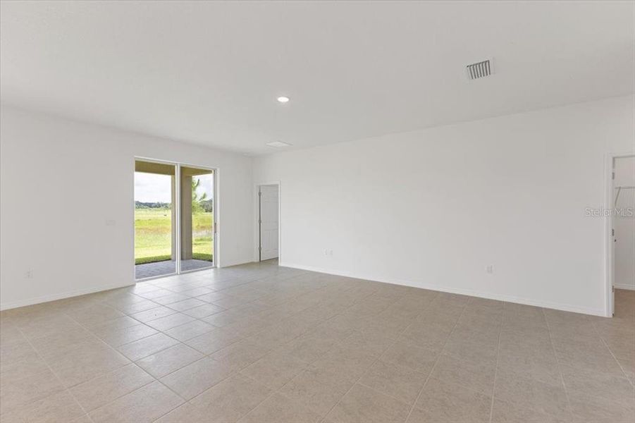 Spacious, unfurnished interior of a new home in Highfield at Twisted Oaks, Wildwood (Image 11).