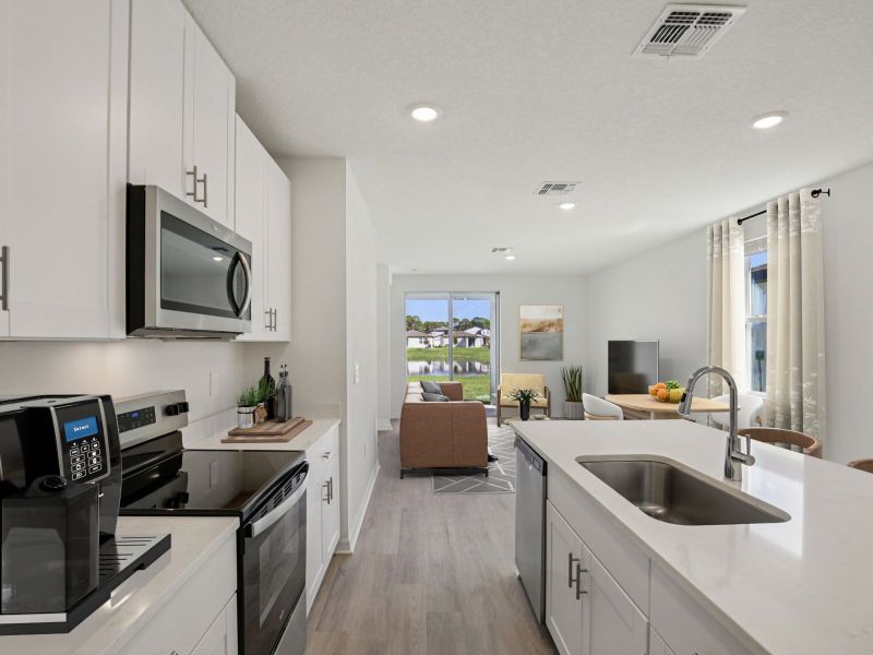 Furnished interior view inside a new home in Benton Hills - Premier Series, Brooksville (Image 5). Furnished interior view inside a new home in Benton Hills - Premier Series, Brooksville (Image 5).