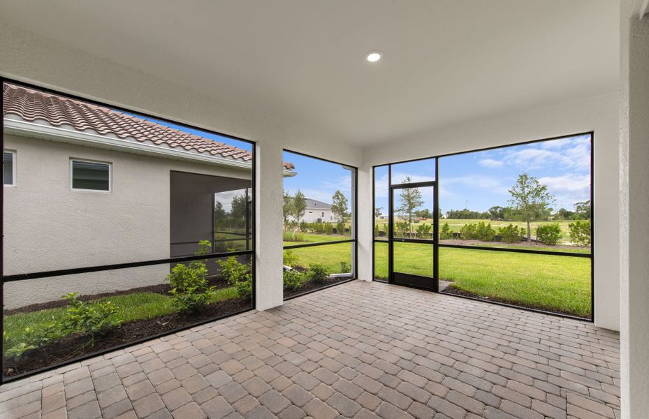 Exterior details and patio area of a home in Del Webb Oak Creek, North Fort Myers (Image 3).