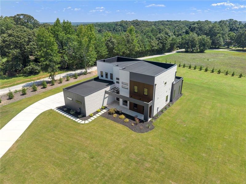 Front exterior of a new home in , McDonough, GA, highlighting curb appeal (Image 32).