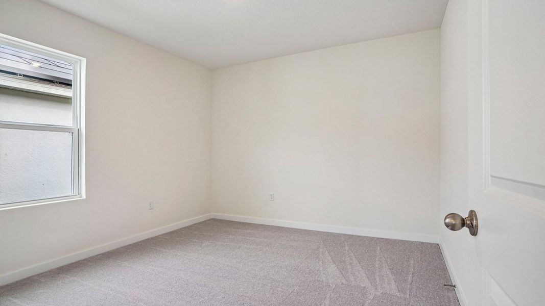 Furnished interior view inside a new home in Willowbrook North, Winter Haven (Image 27).