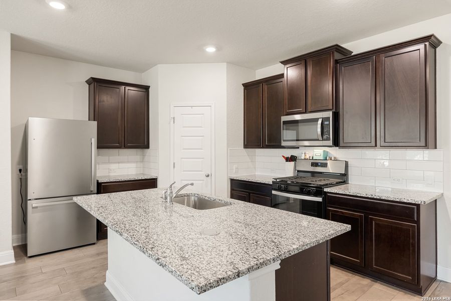 Furnished interior view inside a new home in Riverstone at Westpointe, San Antonio (Image 13).