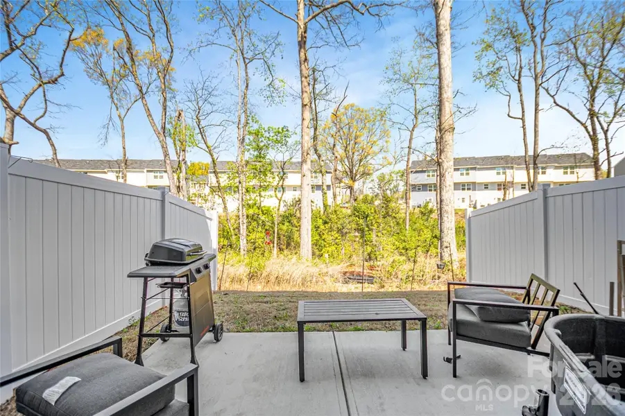 Exterior details and patio area of a home in , Charlotte (Image 3). Exterior details and patio area of a home in , Charlotte (Image 3).