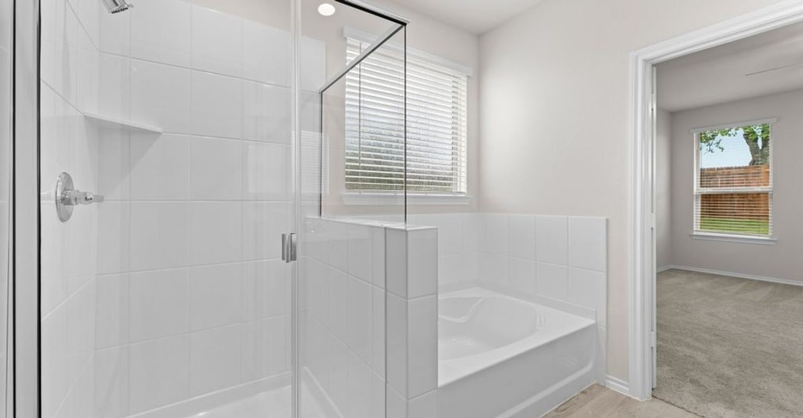 Representative exterior photo of a completed home built from the Willow by Impression Homes in Keeneland, Aubrey, TX (Image 15). Representative exterior photo of a completed home built from the Willow by Impression Homes in Keeneland, Aubrey, TX (Image 15).