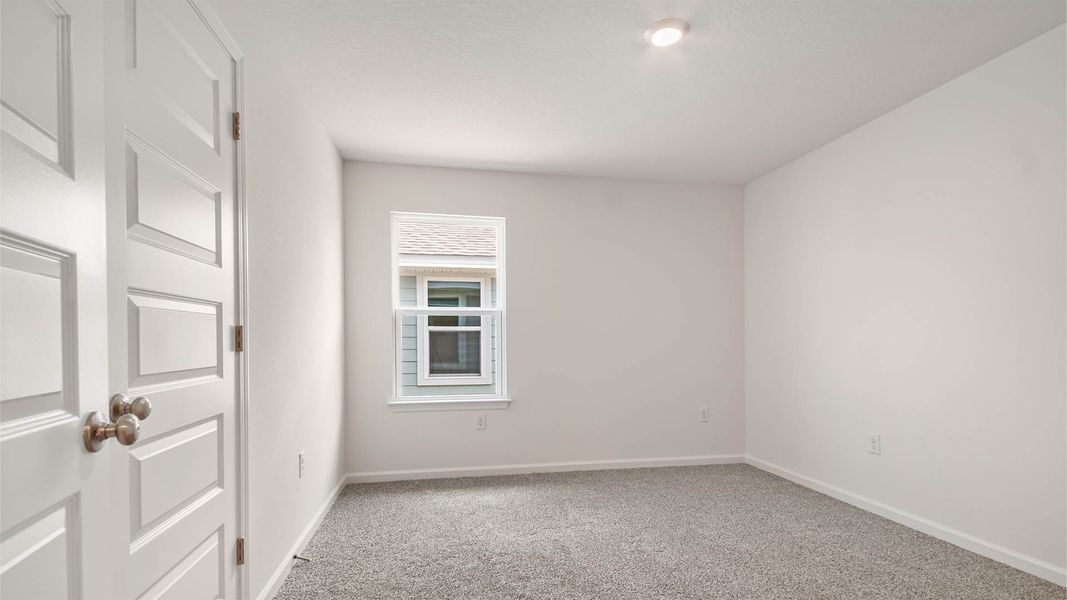 Representative unfurnished interior of a home built from the Ryder by D.R. Horton in Ashton Park Phase III, Freeport (Image 26).