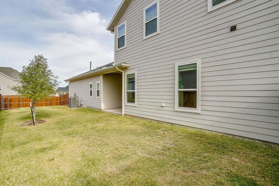 Exterior details and patio area of a home in Walsh, Fort Worth (Image 27). Exterior details and patio area of a home in Walsh, Fort Worth (Image 27).