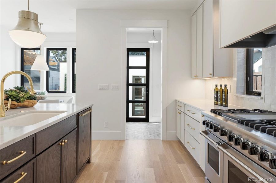 Kitchen with access to mudroom + backyard