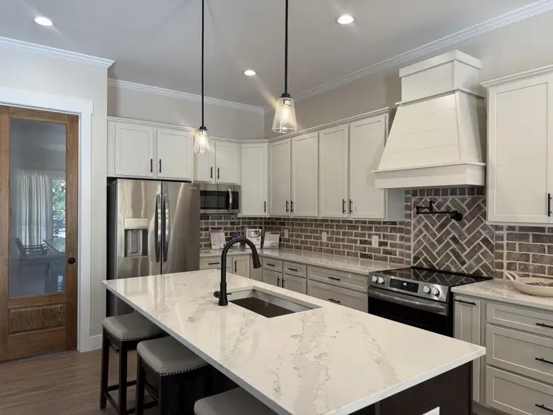 Furnished interior view inside a new home in , Carrollton (Image 5).