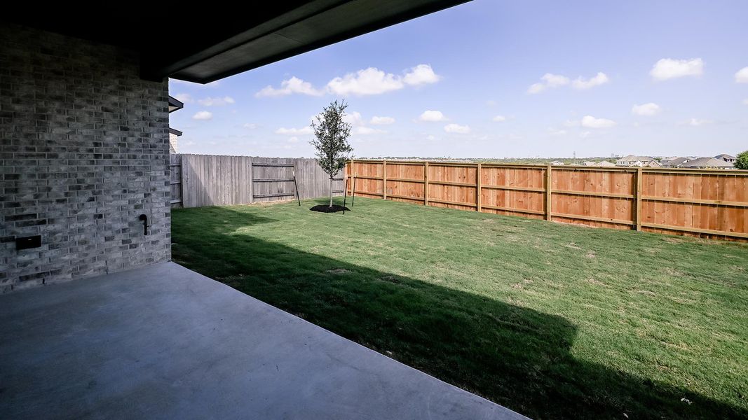 Exterior details and patio area of a home in Crosswinds, Kyle (Image 23).
