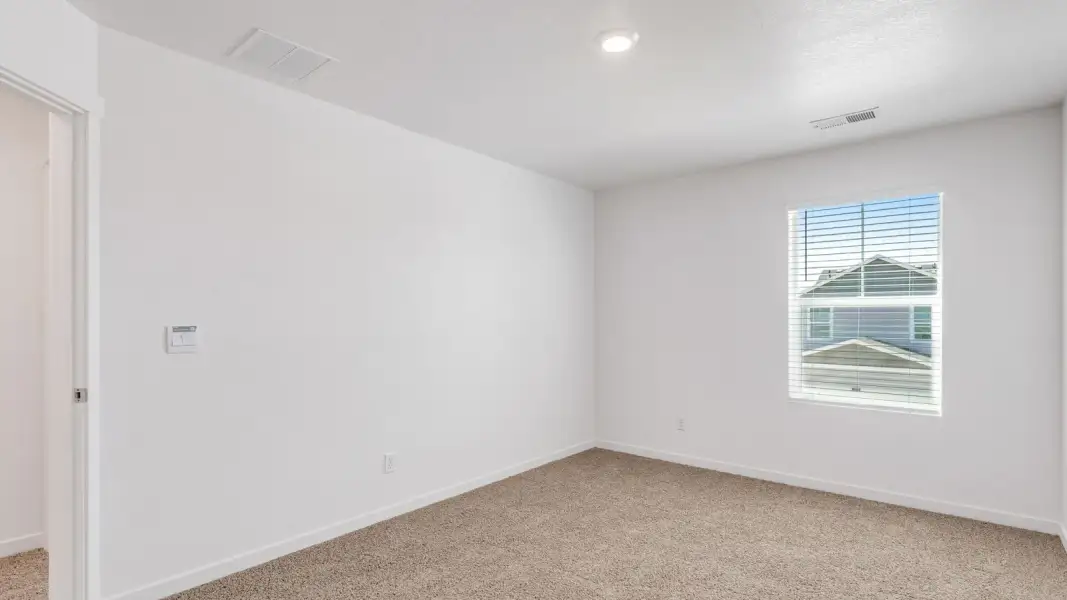 Spacious, unfurnished interior of a new home in Sky Ranch, Watkins (Image 19).