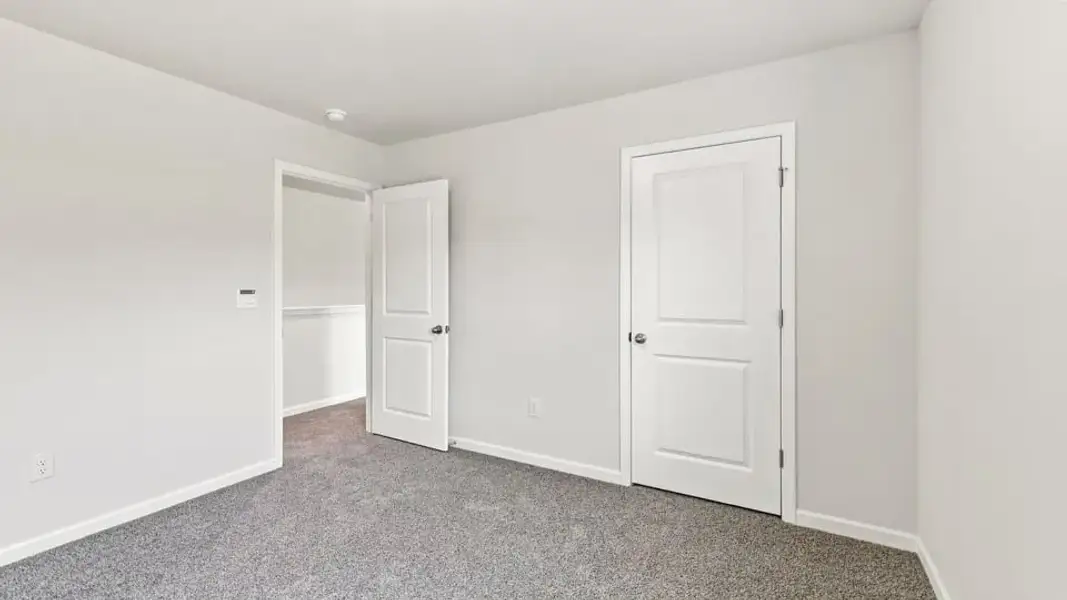 Spacious, unfurnished interior of a new home in Rocky River Ridge, Anderson (Image 34).