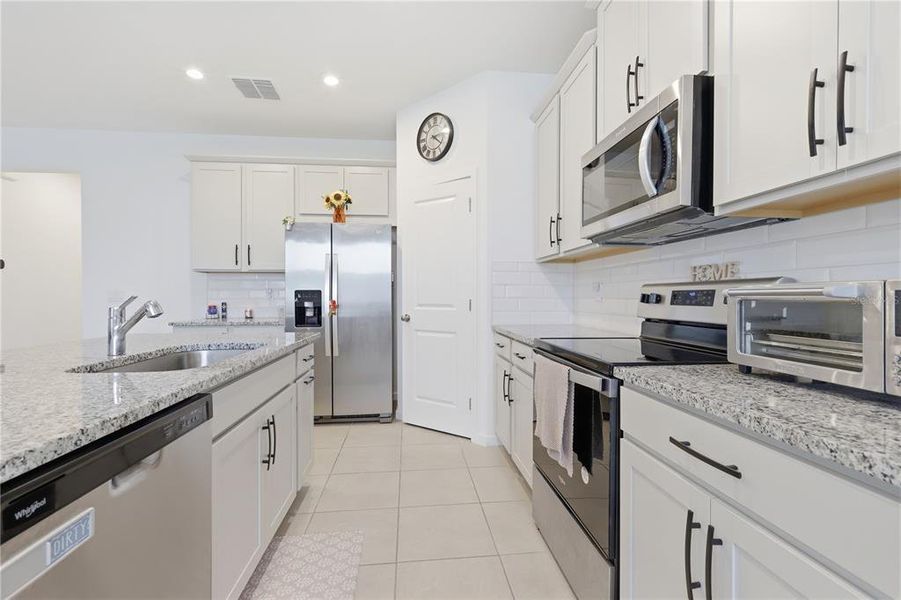 Furnished interior view inside a new home in Grandview Gardens, Deland (Image 8).