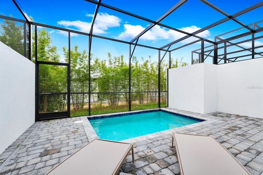 Exterior details and patio area of a home in , Davenport (Image 2).