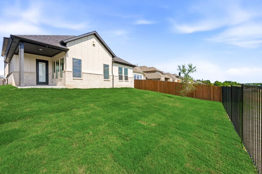 Exterior details and patio area of a home in Parks of Aledo, Aledo (Image 29).