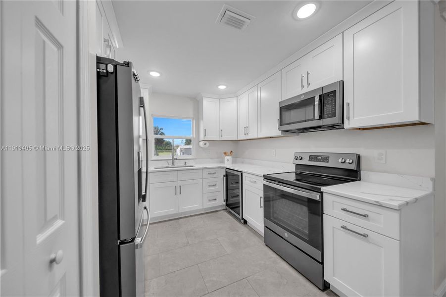 Furnished interior view inside a new home in , Lehigh Acres (Image 33). Furnished interior view inside a new home in , Lehigh Acres (Image 33).