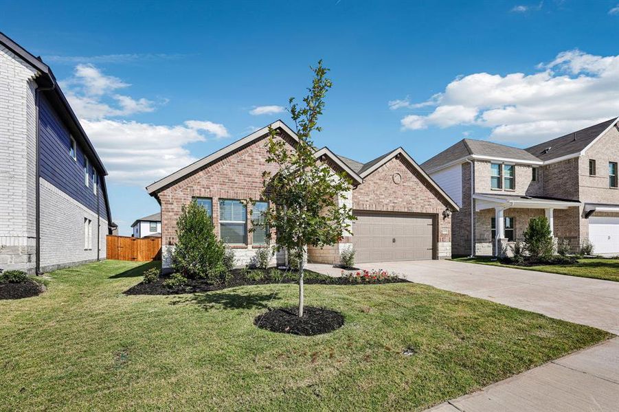 Front exterior of a new home in Lakehaven - Signature Series, Farmersville, TX, highlighting curb appeal (Image 1).
