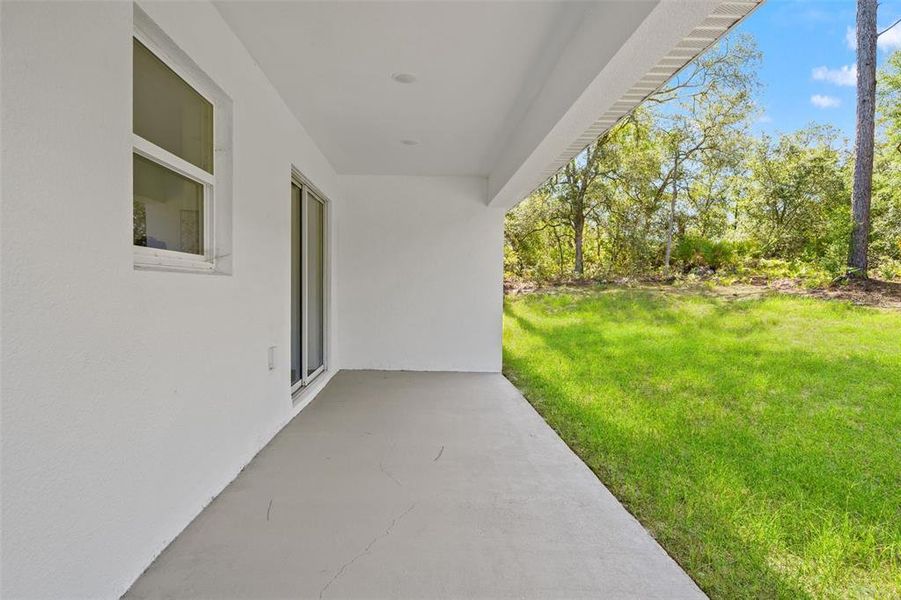 Exterior details and patio area of a home in , Citrus Springs (Image 26).