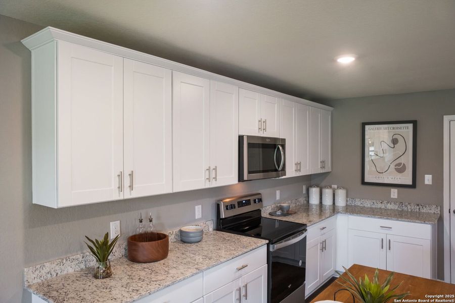 Furnished interior view inside a new home in Cinco Lakes, San Antonio (Image 7). Furnished interior view inside a new home in Cinco Lakes, San Antonio (Image 7).