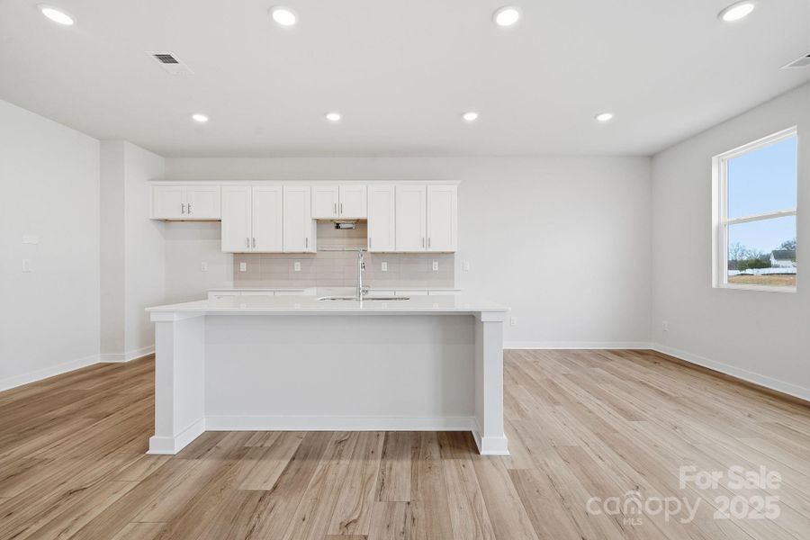 Furnished interior view inside a new home in Meadow Creek Village, Locust (Image 7).