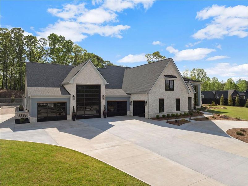 Front exterior of a new home in , Jefferson, GA, highlighting curb appeal (Image 28).
