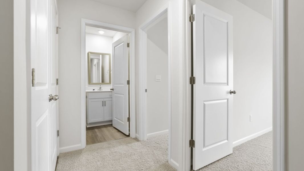 Spacious, unfurnished interior of a new home in Tanglewood Townes, Greenville (Image 28).