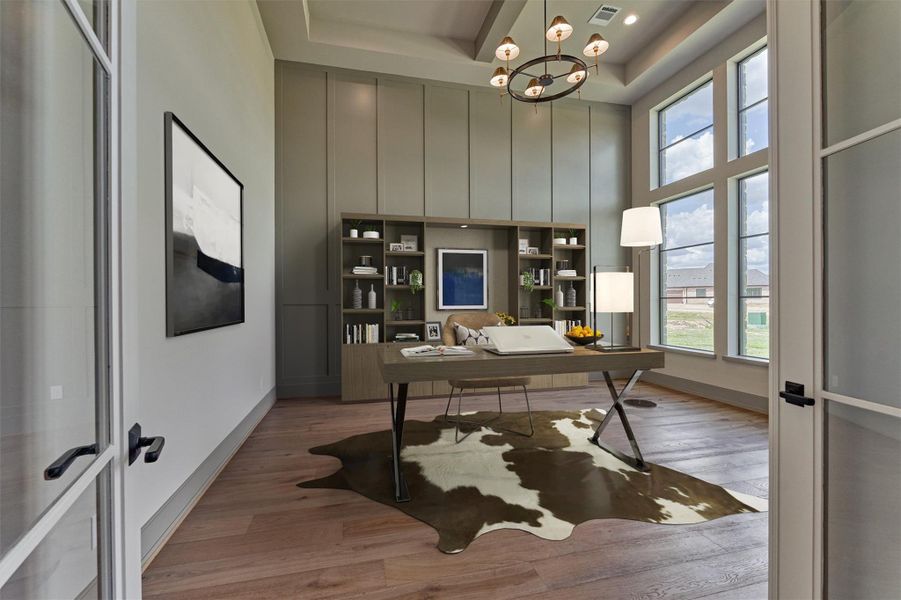 Home office with wonderful natural light, gorgeous windows and detailed tray ceiling. Photo is virtually staged/enhanced. Home office with wonderful natural light, gorgeous windows and detailed tray ceiling. Photo is virtually staged/enhanced.