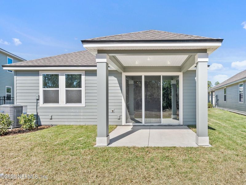 Exterior details and patio area of a home in Seminole Palms, Palm Coast (Image 3).