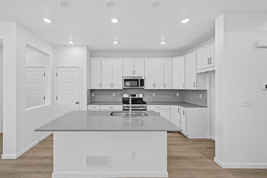 Furnished interior view inside a new home in The Aurora Highlands, Aurora (Image 2). Furnished interior view inside a new home in The Aurora Highlands, Aurora (Image 2).