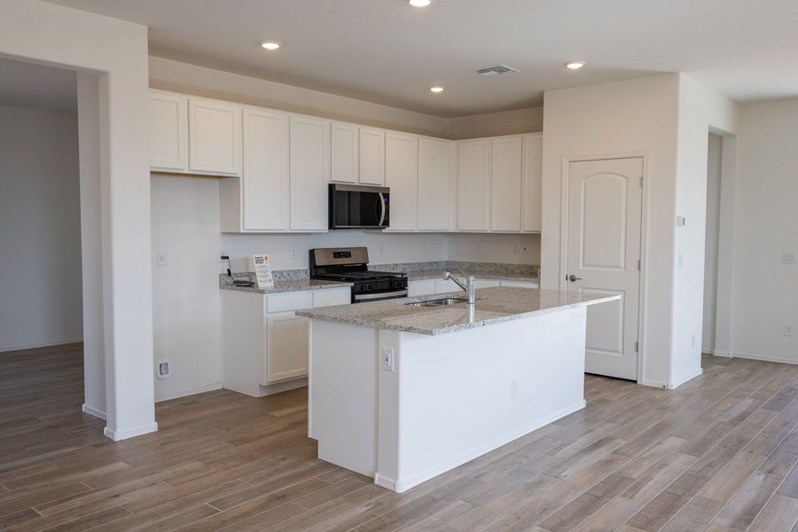 Furnished interior view inside a new home in Colina de Anza Traditions, Tucson (Image 4). Furnished interior view inside a new home in Colina de Anza Traditions, Tucson (Image 4).